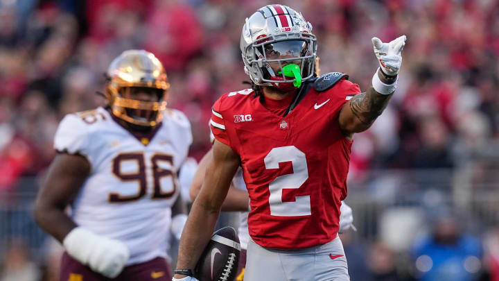 Nov 18, 2023; Columbus, Ohio, USA; Ohio State Buckeyes wide receiver Emeka Egbuka (2) celebrates a first down catch during the NCAA football game against the Minnesota Golden Gophers at Ohio Stadium. Nov 18, 2023; Columbus, Ohio, USA; Ohio State Buckeyes wide receiver Emeka Egbuka (2) celebrates a first down catch during the NCAA football game against the Minnesota Golden Gophers at Ohio Stadium.