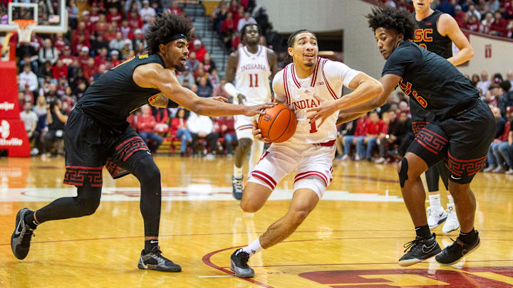 Indiana's Myles Rice (1) has the ball taken by USC's Saint Thomas (0) during the Indiana versus University of Southern California men's basketball game at Simon Skjodt Assembly Hall on Wednesday, Jan. 8, 2025.