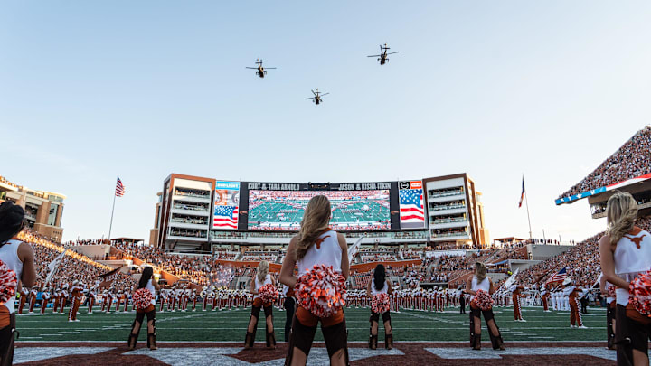 Choppers fly over the field ahead of the Longhorns' game against the ULM Warhawks at Darrell K Royal Texas Memorial Stadium in Austin, Sept. 21, 2024.