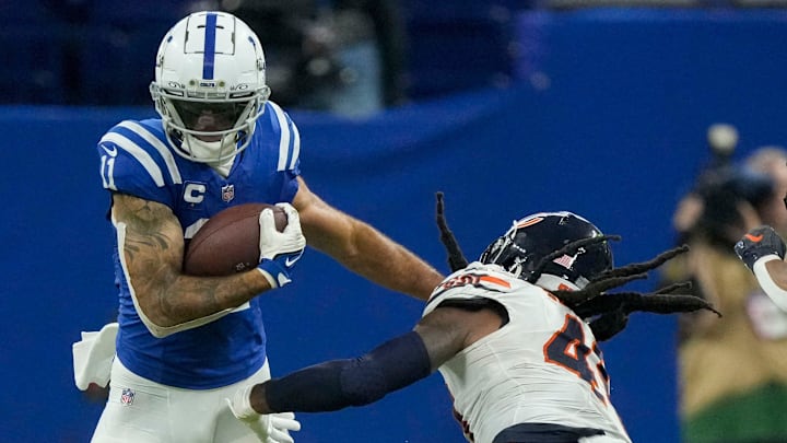Indianapolis Colts wide receiver Michael Pittman Jr. (11) looks to move past Chicago Bears linebacker Tremaine Edmunds (49) Sunday, Sept. 22, 2024, during a game against the Chicago Bears at Lucas Oil Stadium in Indianapolis.