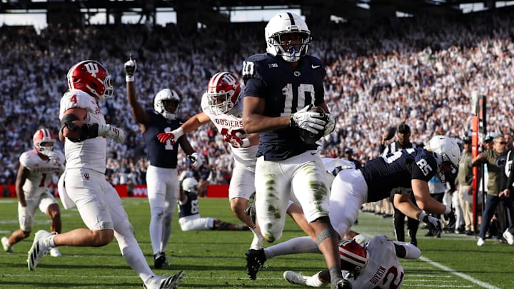 Nov 8, 2025; University Park, Pennsylvania, USA; Penn State Nittany Lions running back Nicholas Singleton (10) runs the ball into the end zone for a touchdown during the fourth quarter against the Indiana Hoosiers at Beaver Stadium. Mandatory Credit: Matthew O'Haren-Imagn Images Nov 8, 2025; University Park, Pennsylvania, USA; Penn State Nittany Lions running back Nicholas Singleton (10) runs the ball into the end zone for a touchdown during the fourth quarter against the Indiana Hoosiers at Beaver Stadium. Mandatory Credit: Matthew O'Haren-Imagn Images