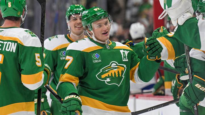 Mar 3, 2026; Saint Paul, Minnesota, USA;  Minnesota Wild forward Kirill Kaprizov (97) is congratulated by teammates after taking sole possession as the franchise leader in goals on an empty netter against the Tampa Bay Lightning during the third period at Grand Casino Arena. Mandatory Credit: Nick Wosika-Imagn Images