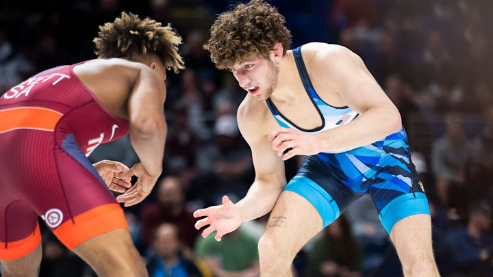 Penn State's Mitchell Mesenbrink (right) wrestles Ladarion Lockett in the 74 kg men's freestyle bracket at the 2024 U.S. Olympic Wrestling Team Trials at the Bryce Jordan Center.