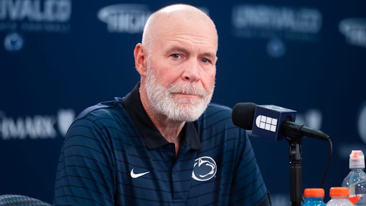 Penn State defensive coordinator Jim Knowles talks with reporters during football media day in Beaver Stadium. Penn State defensive coordinator Jim Knowles talks with reporters during football media day in Beaver Stadium.