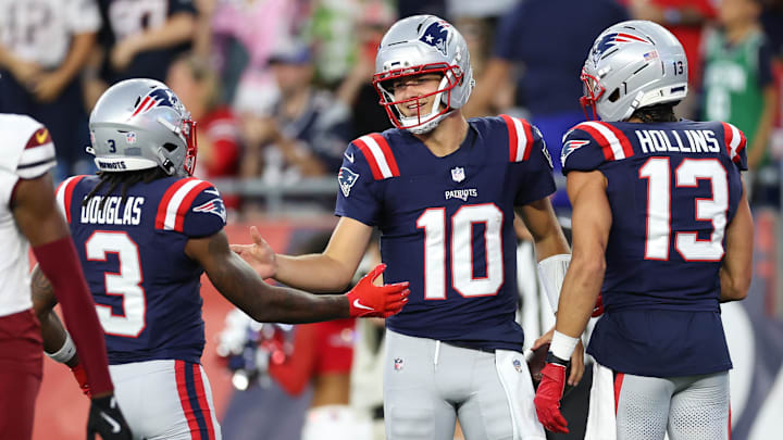 Aug 8, 2025; Foxborough, Massachusetts, USA; New England Patriots quarterback Drake Maye (10) celebrates after scoring a touchdown during the first half against the Washington Commanders at Gillette Stadium. Mandatory Credit: Paul Rutherford-Imagn Images