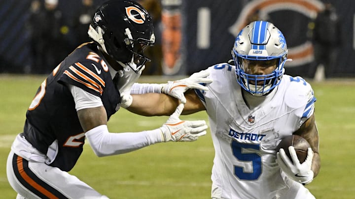Jan 4, 2026; Chicago, Illinois, USA; Detroit Lions running back David Montgomery (5) runs with the ball against Chicago Bears cornerback Nahshon Wright (26) during the second half at Soldier Field. Jan 4, 2026; Chicago, Illinois, USA; Detroit Lions running back David Montgomery (5) runs with the ball against Chicago Bears cornerback Nahshon Wright (26) during the second half at Soldier Field.