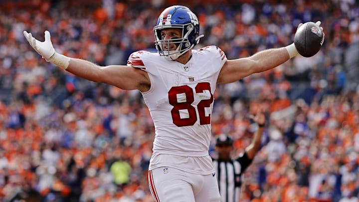 Oct 19, 2025; Denver, Colorado, USA; New York Giants tight end Daniel Bellinger (82) celebrates after scoring a touchdown during the first half against the Denver Broncos at Empower Field at Mile High. Oct 19, 2025; Denver, Colorado, USA; New York Giants tight end Daniel Bellinger (82) celebrates after scoring a touchdown during the first half against the Denver Broncos at Empower Field at Mile High.