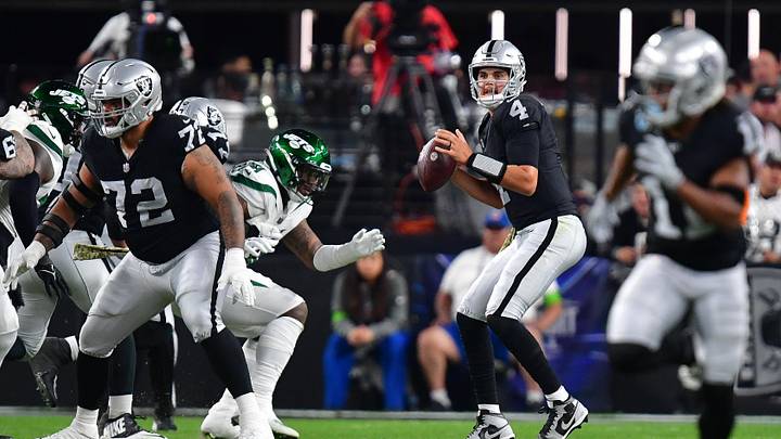 Nov 12, 2023; Paradise, Nevada, USA; Las Vegas Raiders quarterback Aidan O'Connell (4) drops back to pass against the New York Jets during the first half at Allegiant Stadium. Mandatory Credit: Gary A. Vasquez-USA TODAY Sports