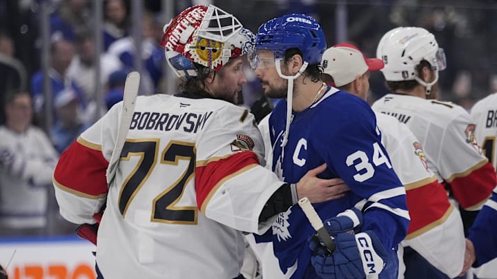 May 18, 2025; Toronto, Ontario, CAN; Toronto Maple Leafs forward Auston Matthews (34) and Florida Panthers goaltender Sergei Bobrovsky (72) shake hands after game seven of the second round of the 2025 Stanley Cup Playoffs at Scotiabank Arena. Mandatory Credit: John E. Sokolowski-Imagn Images