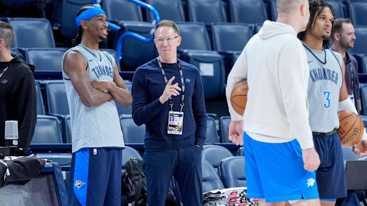 Oklahoma City guard Shai Gilgeous-Alexander (2) talks to Executive Vice President and General Manager is Sam Presti during an NBA Finals practice session ahead of Game 2 at Paycom Center Oklahoma City, on Saturday, June 7, 2025.