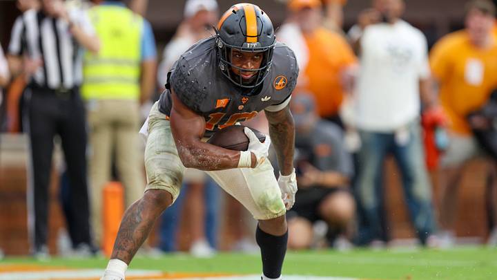 Oct 3, 2026; Knoxville, Tennessee, USA; Tennessee Volunteers running back DeSean Bishop (18) scores a touchdown against the Auburn Tigers during the second half at Neyland Stadium. Mandatory Credit: Randy Sartin-Imagn Images Oct 3, 2026; Knoxville, Tennessee, USA; Tennessee Volunteers running back DeSean Bishop (18) scores a touchdown against the Auburn Tigers during the second half at Neyland Stadium. Mandatory Credit: Randy Sartin-Imagn Images