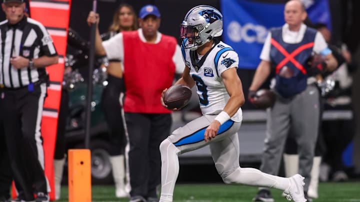 Jan 5, 2025; Atlanta, Georgia, USA; Carolina Panthers quarterback Bryce Young (9) runs the ball for a touchdown against the Atlanta Falcons in the fourth quarter at Mercedes-Benz Stadium. Mandatory Credit: Brett Davis-Imagn Images
