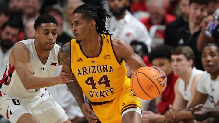 Arizona State Sun Devils guard Adam Miller (44) dribbles the ball around Texas Tech Red Raiders guard Chance McMillian (0) in the first half at United Supermarkets Arena. Arizona State Sun Devils guard Adam Miller (44) dribbles the ball around Texas Tech Red Raiders guard Chance McMillian (0) in the first half at United Supermarkets Arena.