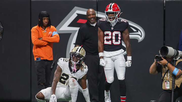 Sep 29, 2024; Atlanta, Georgia, USA; Atlanta Falcons cornerback Dee Alford (20) stands over New Orleans Saints wide receiver Rashid Shaheed (22) after a pass break up in the fourth quarter at Mercedes-Benz Stadium.