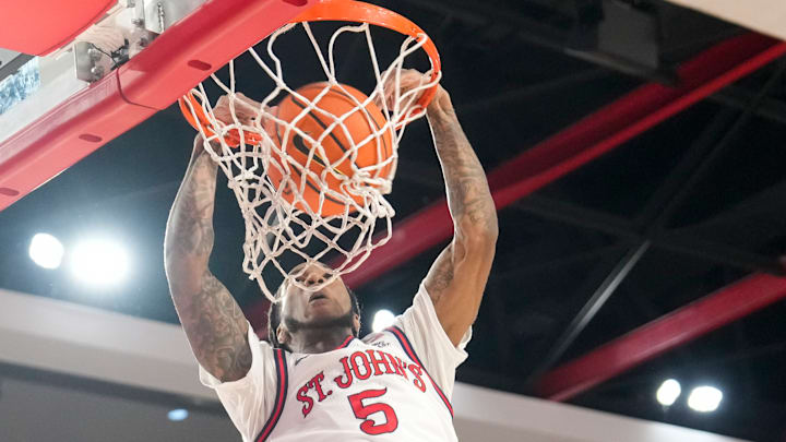 Kansas State v St. John's; St. John's basketball guard Deivon Smith dunks against Kansas State inside Carnesecca Arena. 
