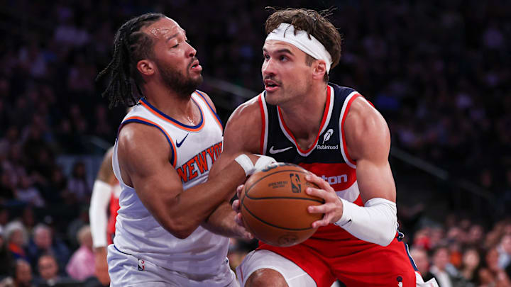 Oct 9, 2024; New York, New York, USA; Washington Wizards forward Corey Kispert (24) is defended by New York Knicks guard Jalen Brunson (11) during the first quarter at Madison Square Garden. Mandatory Credit: Vincent Carchietta-Imagn Images
