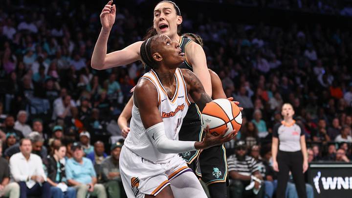 Sep 17, 2025; Brooklyn, New York, USA; Phoenix Mercury forward Natasha Mack (4) and New York Liberty forward Breanna Stewart (30) during game two of round one for the 2025 WNBA Playoffs at Barclays Center. Mandatory Credit: Wendell Cruz-Imagn Images