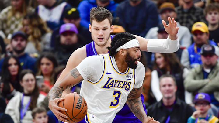 Dec 1, 2024; Salt Lake City, Utah, USA; Los Angeles Lakers forward/center Anthony Davis (3) turns past Utah Jazz center Walker Kessler (24) during the first half at the Delta Center. Mandatory Credit: Christopher Creveling-Imagn Images