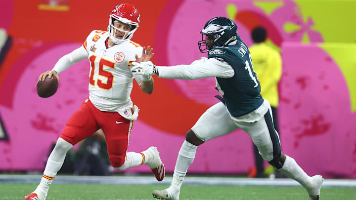 Feb 9, 2025; New Orleans, LA, USA; Kansas City Chiefs quarterback Patrick Mahomes (15) is tackled by Philadelphia Eagles linebacker Josh Sweat (19) in Super Bowl LIX between the Philadelphia Eagles and the Kansas City Chiefs at Ceasars Superdome. Mandatory Credit: Mark J. Rebilas-Imagn Images
