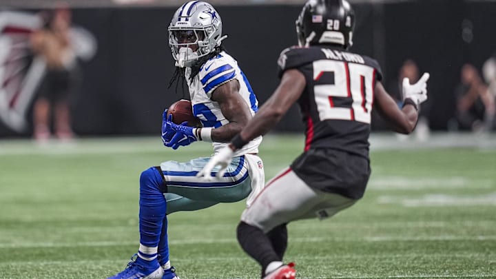 Dallas Cowboys wide receiver CeeDee Lamb runs against Atlanta Falcons cornerback Dee Alford.