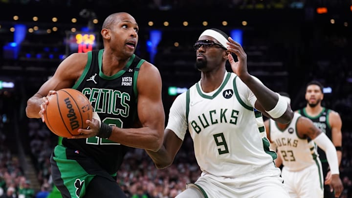 May 1, 2022; Boston, Massachusetts, USA; Boston Celtics center Al Horford (42) drives to the basket against Milwaukee Bucks center Bobby Portis (9) in the first quarter during game one of the second round for the 2022 NBA playoffs at TD Garden. Mandatory Credit: David Butler II-Imagn Images