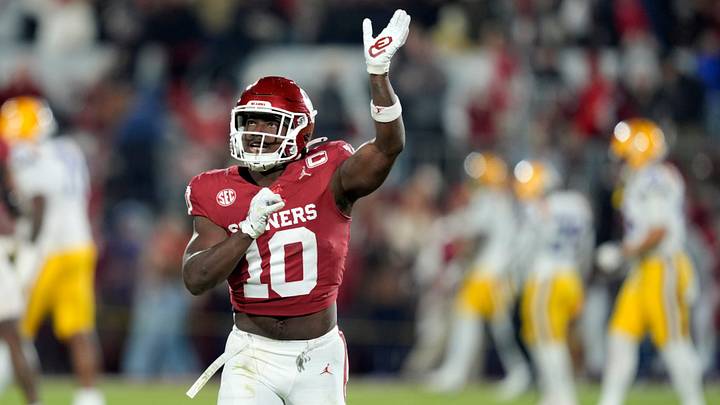 Oklahoma Sooners linebacker Kip Lewis celebrates during a college football game Oklahoma Sooners linebacker Kip Lewis celebrates during a college football game