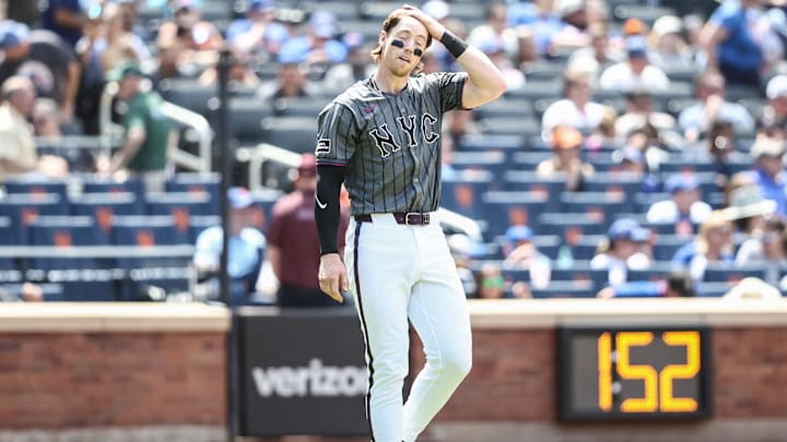 May 25, 2024; New York City, New York, USA;  New York Mets third baseman Brett Baty (22) goes back on the field after striking out to the end the fourth inning against the San Francisco Giants at Citi Field. Mandatory Credit: Wendell Cruz-USA TODAY Sports