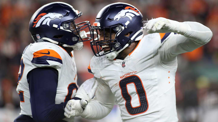 December 28, 2024: Denver Broncos LB Jonathon Cooper (0) celebrates with a teammate during WEEK 17 of the NFL, American Football Herren, USA regular season between the Cincinnati Bengals and the Denver Broncos in Cincinnati, Ohio. December 28, 2024: Denver Broncos LB Jonathon Cooper (0) celebrates with a teammate during WEEK 17 of the NFL, American Football Herren, USA regular season between the Cincinnati Bengals and the Denver Broncos in Cincinnati, Ohio.