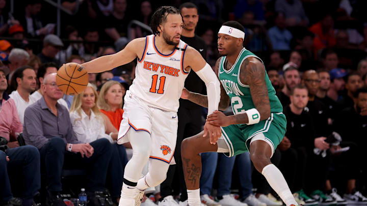 May 16, 2025; New York, New York, USA; New York Knicks guard Jalen Brunson (11) controls the ball against Boston Celtics forward Torrey Craig (12) during the fourth quarter of game six in the second round of the 2025 NBA Playoffs at Madison Square Garden. Mandatory Credit: Brad Penner-Imagn Images