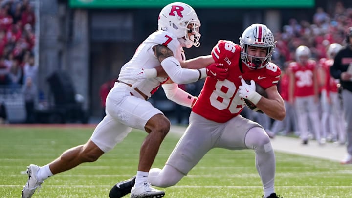Ohio State Buckeyes tight end Max Klare (86) tries to run past Rutgers Scarlet Knights defensive back Cam Miller (7) during the NCAA football game at Ohio Stadium in Columbus on Nov. 22, 2025. Ohio State won 42-9.