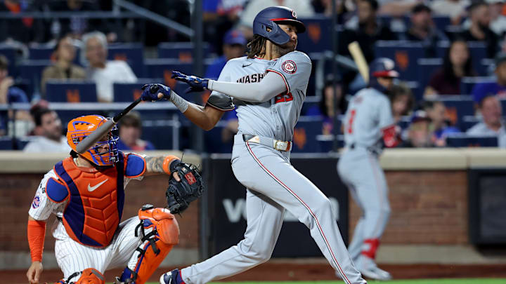 Sep 17, 2024; New York City, New York, USA; Washington Nationals left fielder James Wood (29) follows through on a run scoring fielders choice during the third inning against the New York Mets at Citi Field. 