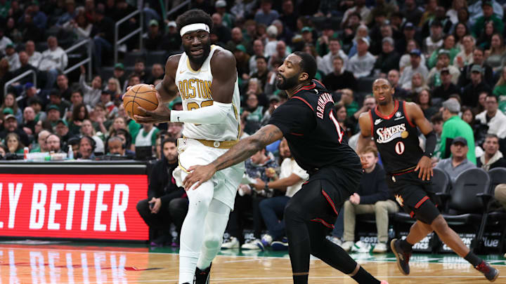 Mar 1, 2026; Boston, Massachusetts, USA; Boston Celtics center Neemias Queta (88) drives to the basket defended by Philadelphia 76ers center Andre Drummond (1) during the second half at TD Garden. Mandatory Credit: Paul Rutherford-Imagn Images