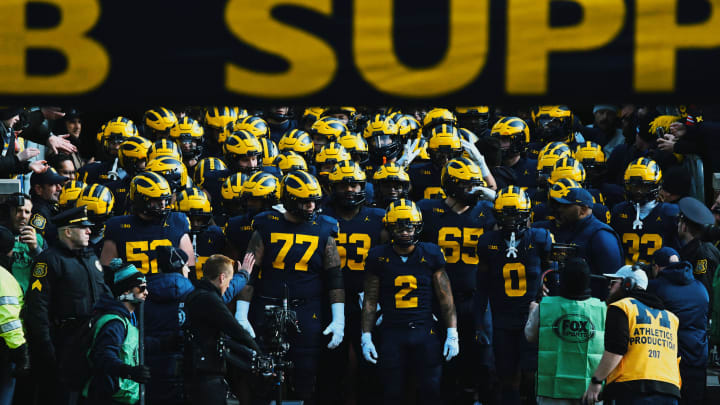 The Michigan Wolverines enter Michigan Stadium The Michigan Wolverines enter Michigan Stadium