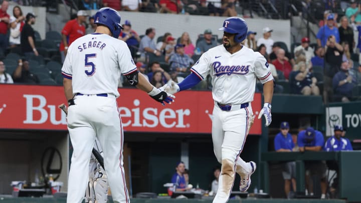 Jul 25, 2024; Arlington, Texas, USA; Texas Rangers second base Marcus Semien (2) celebrates with shortstop Corey Seager (5) after hitting a home run against the Chicago White Sox in the third inning at Globe Life Field. Mandatory Credit: Tim Heitman-USA TODAY Sports Jul 25, 2024; Arlington, Texas, USA; Texas Rangers second base Marcus Semien (2) celebrates with shortstop Corey Seager (5) after hitting a home run against the Chicago White Sox in the third inning at Globe Life Field. Mandatory Credit: Tim Heitman-USA TODAY Sports
