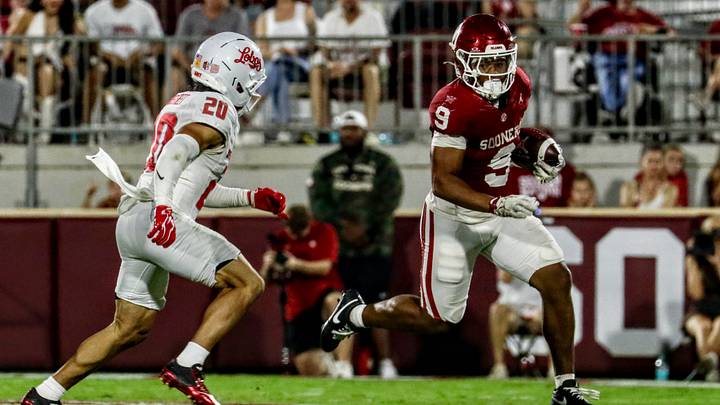 Lloyd Avant carries the ball for a rush against New Mexico.