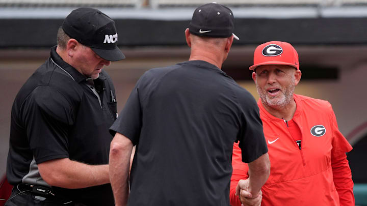 Georgia coach Wes Johnson shakes hands with Binghamton coach Tim Sinicki before the start of a NCAA Regionals game against Binghamton in Athens, Ga., on Friday, May 30, 2025.