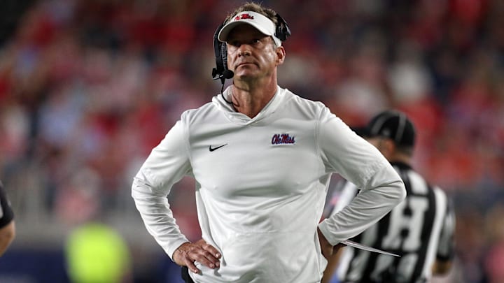 Nov 15, 2025; Oxford, Mississippi, USA; Mississippi Rebels head coach Lane Kiffin looks on during a time out during the first quarter against the Florida Gators at Vaught-Hemingway Stadium. Mandatory Credit: Petre Thomas-Imagn Images
