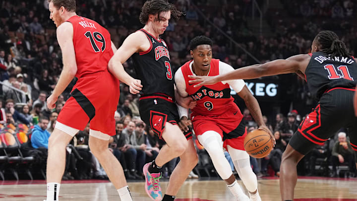 Dec 16, 2024; Toronto, Ontario, CAN; Toronto Raptors guard RJ Barrett (9) controls the ball against Chicago Bulls guard Josh Giddey (3) during the first quarter at Scotiabank Arena. Mandatory Credit: Nick Turchiaro-Imagn Images Dec 16, 2024; Toronto, Ontario, CAN; Toronto Raptors guard RJ Barrett (9) controls the ball against Chicago Bulls guard Josh Giddey (3) during the first quarter at Scotiabank Arena. Mandatory Credit: Nick Turchiaro-Imagn Images