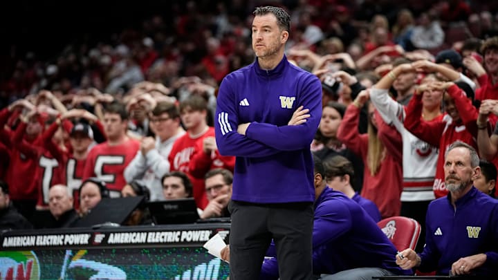 Washington head coach Danny Sprinkle watches during a men's basketball game against Ohio State on Feb. 13, 2025, at Value City Arena.