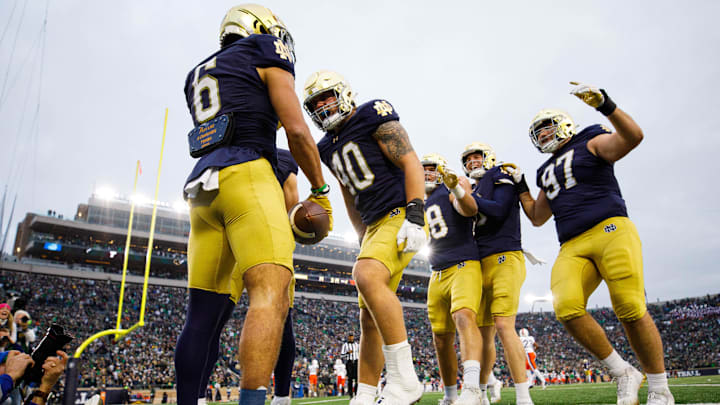 Notre Dame wide receiver Jordan Faison (6) celebrates scoring a touchdown on a fake punt play that would later be called back during a NCAA college football game against Virginia at Notre Dame Stadium on Saturday, Nov. 16, 2024, in South Bend.