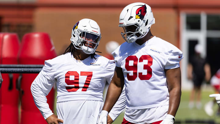 Jun 10, 2025; Tempe, AZ, USA; Arizona Cardinals defensive lineman Walter Nolen III (97) talks with Calais Campbell (93) during minicamp at the teams Arizona Cardinals Training Facility. Mandatory Credit: Mark J. Rebilas-Imagn Images Jun 10, 2025; Tempe, AZ, USA; Arizona Cardinals defensive lineman Walter Nolen III (97) talks with Calais Campbell (93) during minicamp at the teams Arizona Cardinals Training Facility. Mandatory Credit: Mark J. Rebilas-Imagn Images
