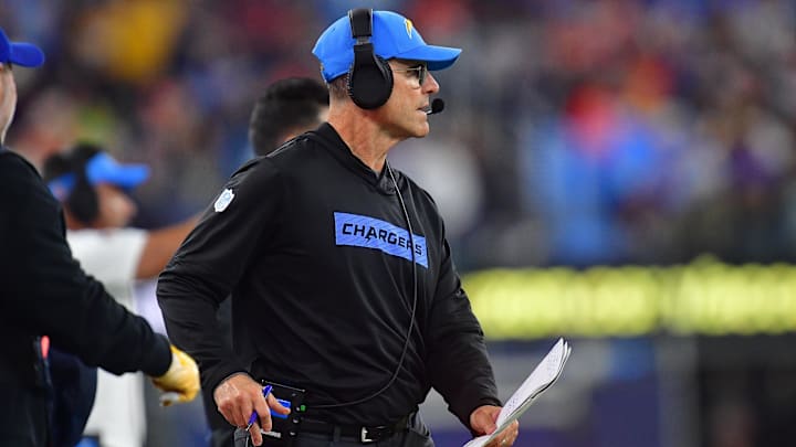 Dec 19, 2024; Inglewood, California, USA; Los Angeles Chargers head coach Jim Harbaugh watches game action before playing against the Denver Broncos during the first half at SoFi Stadium. 