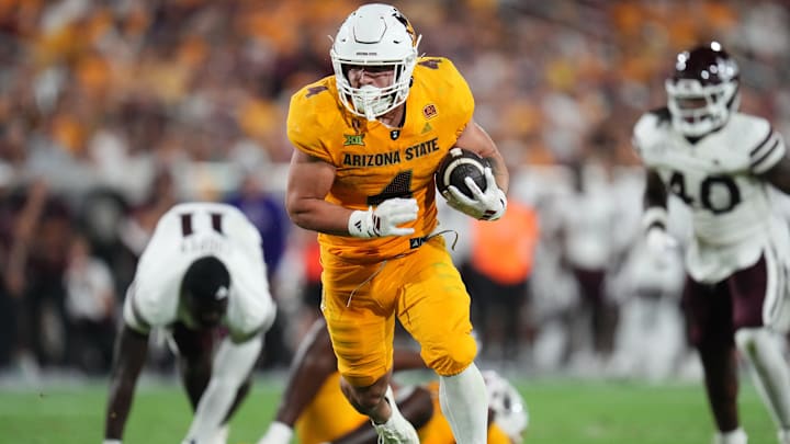 Arizona State running back Cam Skattebo (4). Arizona State running back Cam Skattebo (4).