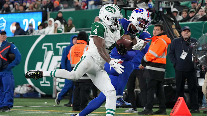 New York Jets cornerback D.J. Reed (4) breaks up a pass for Buffalo Bills wide receiver Keon Coleman (0) 