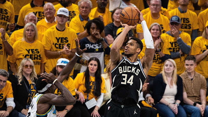 Apr 29, 2025; Indianapolis, Indiana, USA; Milwaukee Bucks forward Giannis Antetokounmpo (34) shoots the ball while  Indiana Pacers forward Pascal Siakam (43) defends during game five of the first round for the 2024 NBA Playoffs at Gainbridge Fieldhouse. Mandatory Credit: Trevor Ruszkowski-Imagn Images