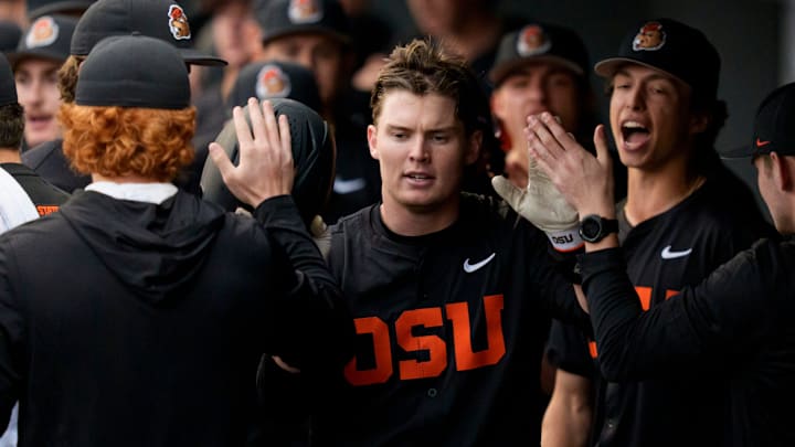 Oregon State infielder Ethan Porter celebrates with teammates after scoring as the Oregon Ducks host the Oregon State Beavers on March 3, 2026, at PK Park in Eugene, Oregon.