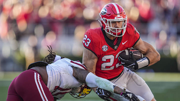 Nov 23, 2024; Athens, Georgia, USA; Georgia Bulldogs tight end Jaden Reddell (23) runs after a catch against the Massachusetts Minutemen during the second half at Sanford Stadium. Mandatory Credit: Dale Zanine-Imagn Images