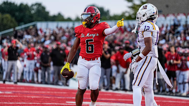 Orchard Lake St. Mary's wide receiver Lorenzo Barber celebrates a first down against Warren De La Salle during the first half at Orchard Lake St. Mary's in West Bloomfield Township on Friday, Sept. 13, 2024.