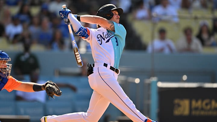 Jul 16, 2022; Los Angeles, CA, USA; National League Futures right fielder Robert Hassell III (9) singles in the second inning of the All Star-Futures Game at Dodger Stadium. Jul 16, 2022; Los Angeles, CA, USA; National League Futures right fielder Robert Hassell III (9) singles in the second inning of the All Star-Futures Game at Dodger Stadium.