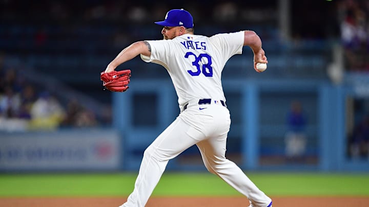 Jul 21, 2025; Los Angeles, California, USA; Los Angeles Dodgers pitcher Kirby Yates (38) throws against the Minnesota Twins during the ninth inning at Dodger Stadium. Mandatory Credit: Gary A. Vasquez-Imagn Images